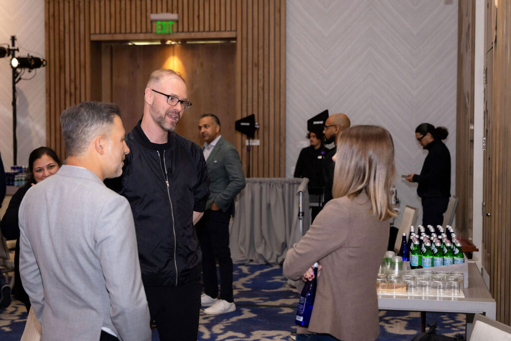 Abnormal AI Co-Founder & CEO Evan Reiser with Menlo Ventures' partner Houman Haghighi and Box CISO Heather Ceylan at Menlo's 2026 AI Cyber Summit